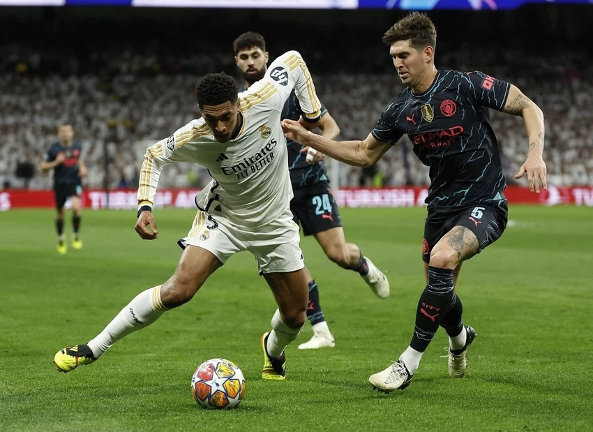 Man City và Real Madrid rượt đuổi ngoạn mục, Arsenal hòa Bayern Munich
